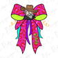 A colorful bow with a cowboy hat and the word "Reals" written on it.
