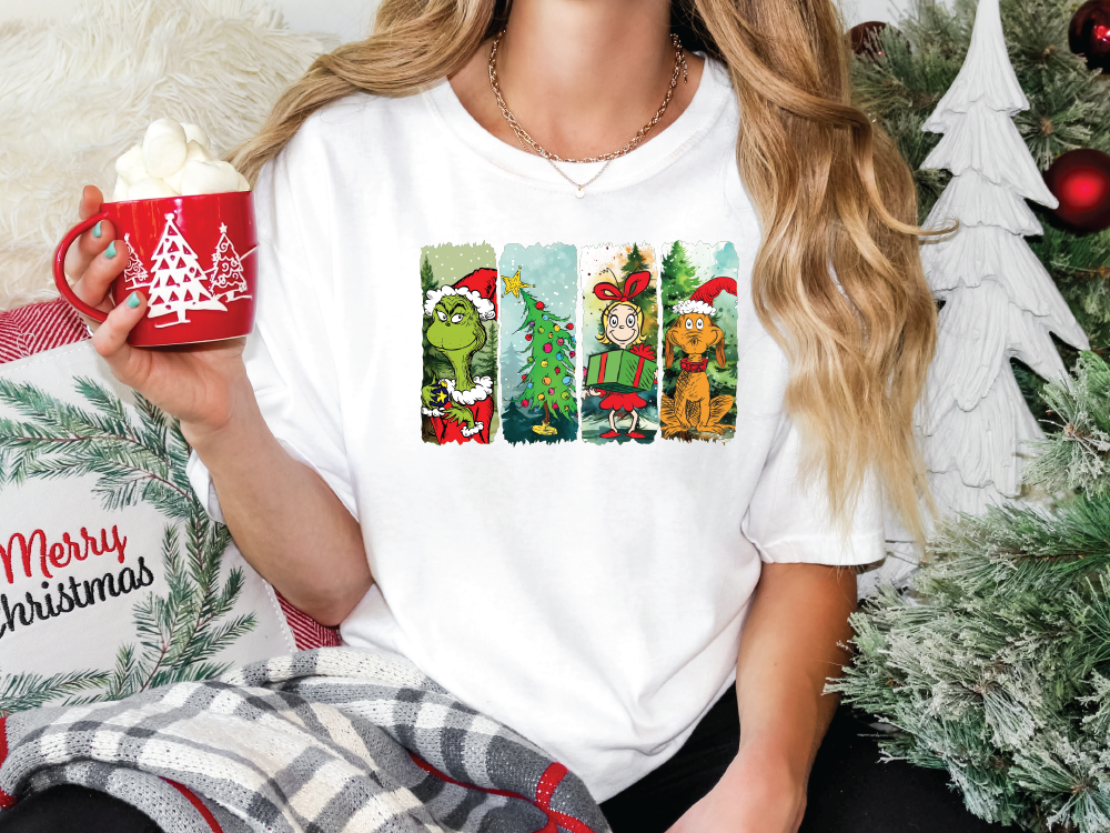 a woman holding a cup of coffee in front of a christmas tree