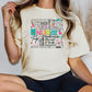 a woman sitting on a chair wearing a nurse t - shirt