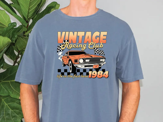 a man wearing a vintage racing club t - shirt