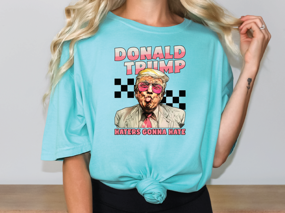 a woman wearing a donald trump t - shirt