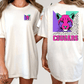 A woman wearing a white t-shirt with a graphic of a cougar and the word "Cougars" printed on the back.