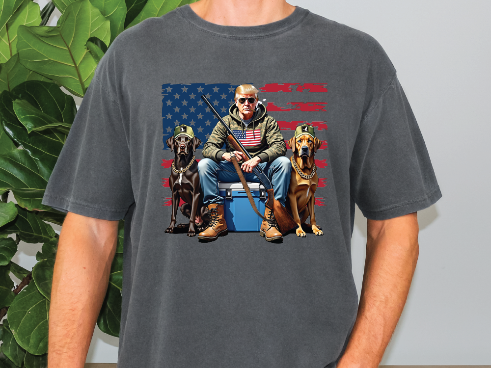 a man sitting on top of a blue trash can next to three dogs