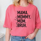 a woman wearing a pink shirt that says mama, mommy, and bruh