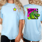 two people wearing light blue t-shirts with a graphic design featuring a green dragon wearing sunglasses.