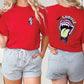 two women wearing matching red shirts and shorts