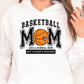 a woman wearing a white hoodie with a basketball mom on it