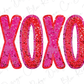 the word xoxo is made up of pink and red sequins