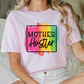 a woman sitting on a bed wearing a t - shirt that says mother huster