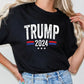 a woman wearing a black trump t - shirt