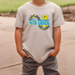 a young boy wearing a t - shirt that says 6th grade