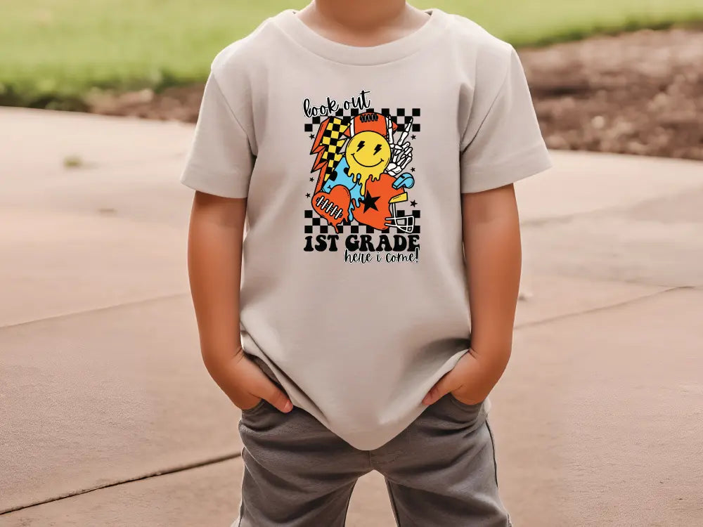 a little boy that is wearing a shirt