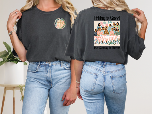 two women wearing black t - shirts with a cross on the back