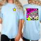 two women wearing light blue t-shirts with a graphic design featuring a wolf wearing sunglasses.