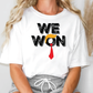 a woman wearing a t - shirt that says we won