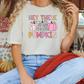 a woman sitting on a couch wearing a t - shirt that says hey there pumpkin