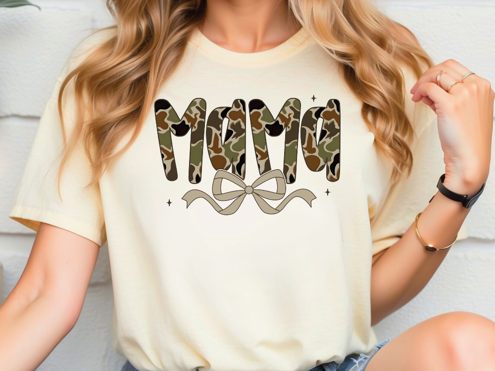 a woman wearing a t - shirt with the word mom printed on it