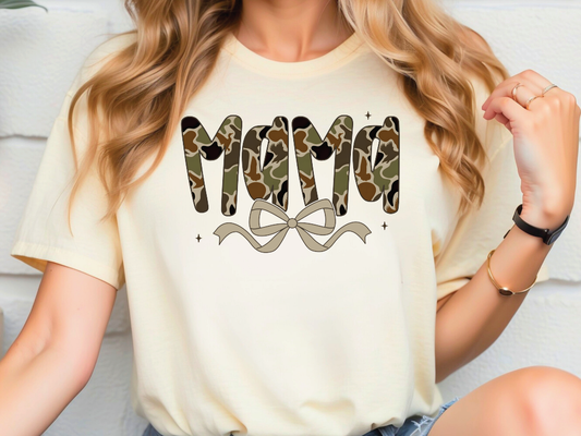 a woman wearing a t - shirt with the word mom printed on it