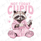 a raccoon in a pink robe holding a remote control