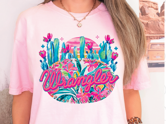 a woman with long hair wearing a pink shirt