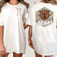 two women wearing white t-shirts with a graphic design on the back. The design features a brown bear with a bow on its neck and the word "BEARS" written below the bear's head.