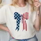 a woman wearing a patriotic bow t - shirt