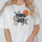 a woman wearing a game day t - shirt with basketballs on it