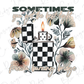 a black and white checkered candle with flowers on it