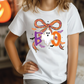 A person wearing a white t-shirt with a graphic design featuring a ghost and the word "BOO" in a playful, festive style.