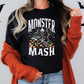 a woman wearing a black monster mash t - shirt