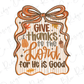 a decorative sign with a bow and autumn-themed elements, along with a message that reads "Give thanks to the Lord for He is Good".