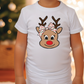 a young child wearing a white shirt with a reindeer head on it