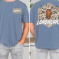 a man wearing a blue t-shirt with a graphic design featuring a bull's head and the word "Longhorns" written on it.