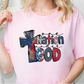 a blonde woman wearing a pink t - shirt that says nation of god