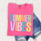 a pink shirt that says summer vibes on it