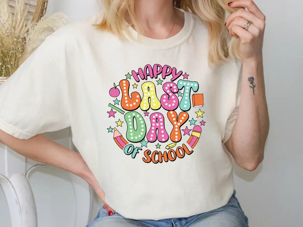 a woman sitting on a chair wearing a happy birthday t - shirt