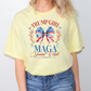 a woman wearing a yellow trump girl t - shirt