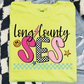 A yellow t-shirt with a colorful graphic design and text printed on it.