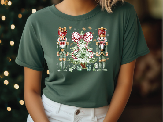 a woman wearing a green t - shirt with a christmas scene on it