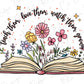 an open book with flowers and stars on it