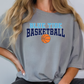 a woman wearing a blue tide basketball t - shirt