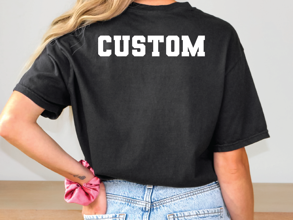 a woman wearing a black shirt with the word custom printed on it