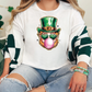 a woman sitting on a couch wearing a st patrick's day shirt