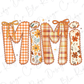 the word "Mimi" made up of various fabric pieces in different colors and patterns, with bows and flowers adorning the letters.