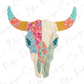 A colorful patchwork design of a cow's head, featuring various fabrics and patterns in shades of blue, orange, green, and white.