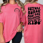 two women wearing pink shirts with black lettering