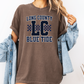 a woman wearing a long country blue tide t - shirt