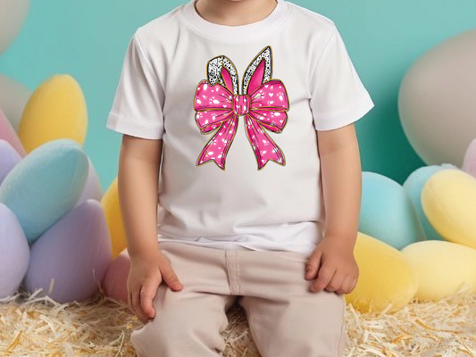 a little girl sitting in front of a bunch of balloons