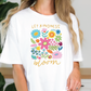 a woman wearing a t - shirt that says let kindness bloom