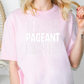 a woman wearing a pink shirt with the words mama, pageant, and